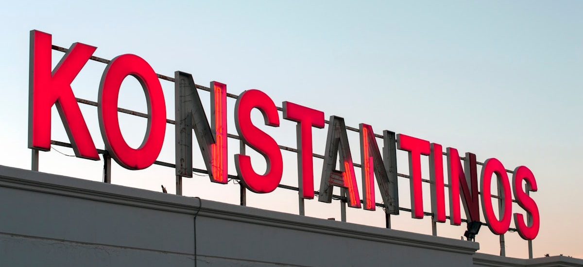 Konstantinos signage on top of the building