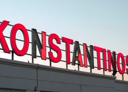 Konstantinos signage on top of the building